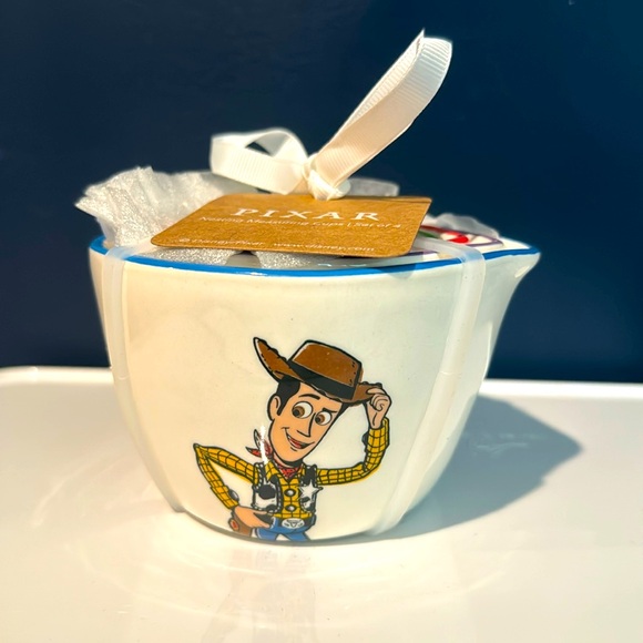 Rae Dunn Other - NWT Disney Pixar Rae Dunn Toy Story measuring cups